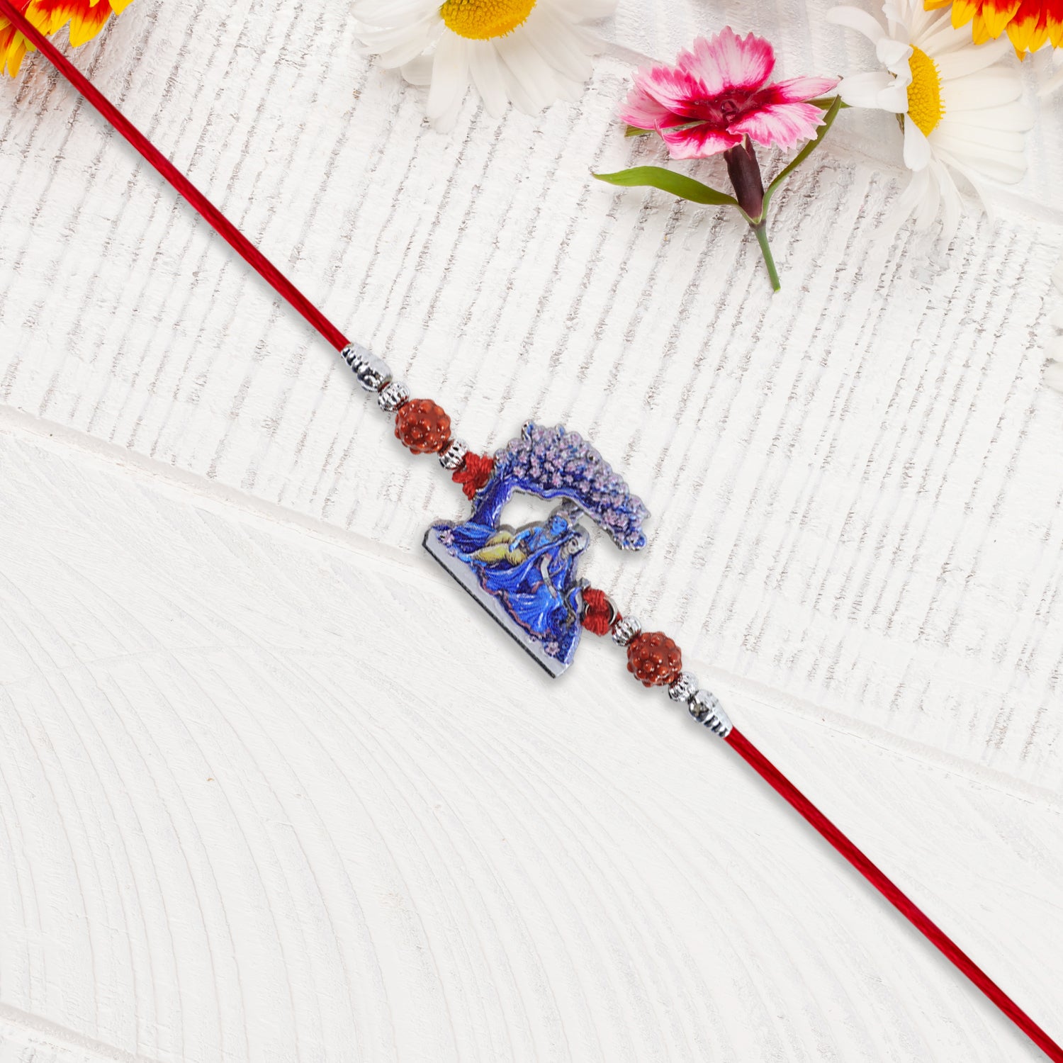 Radha Krishna Rakhi Under Tree Design With Rudraksha  Red Mauli Thread Radha Krishna Rakhi Under Tree Design With Rudraksha  Red Mauli Thread